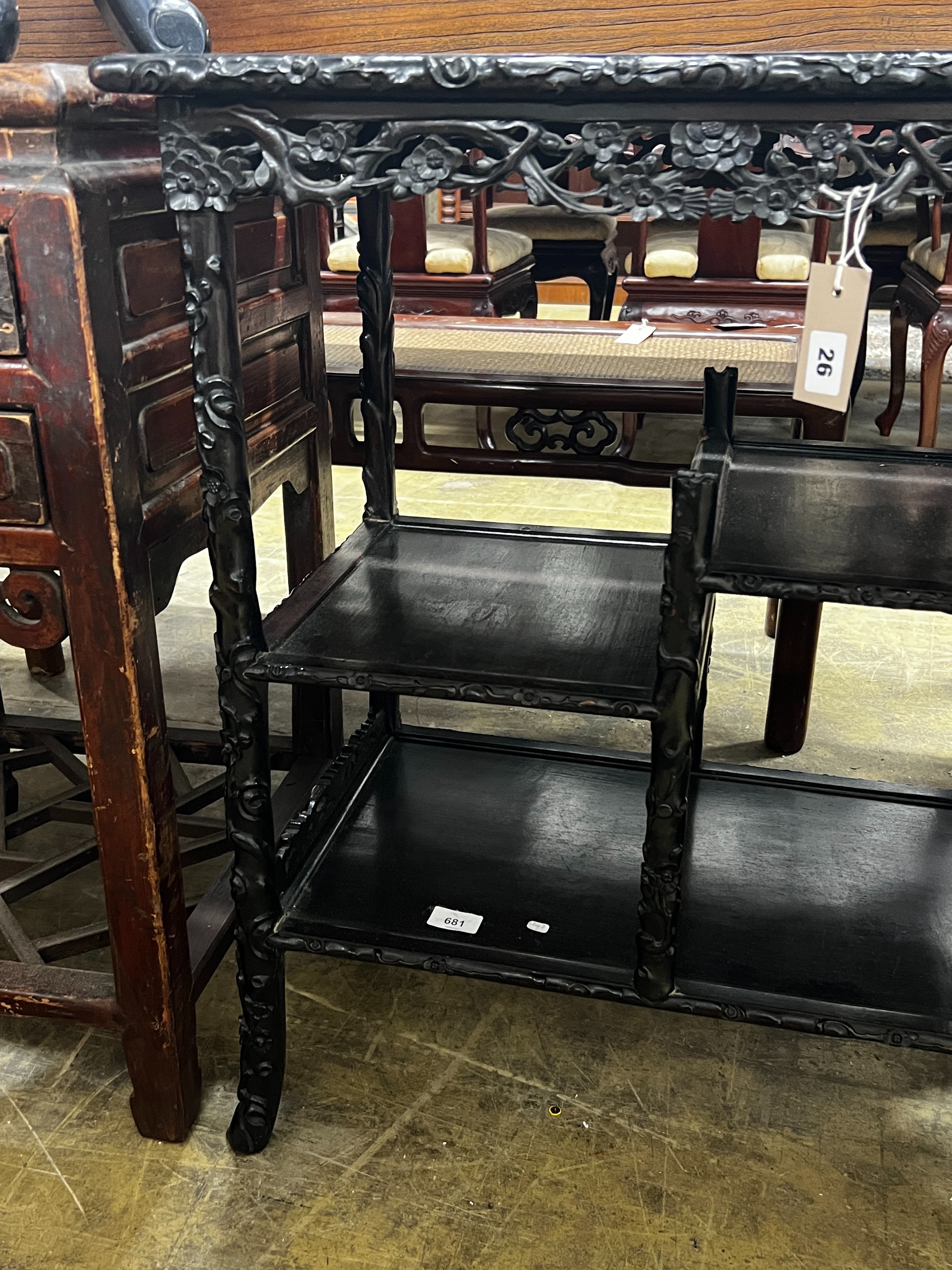 A Chinese rectangular carved hongmu tiered display table, length 67cm, depth 38cm, height 78cm *Please note the sale commences at 9am.